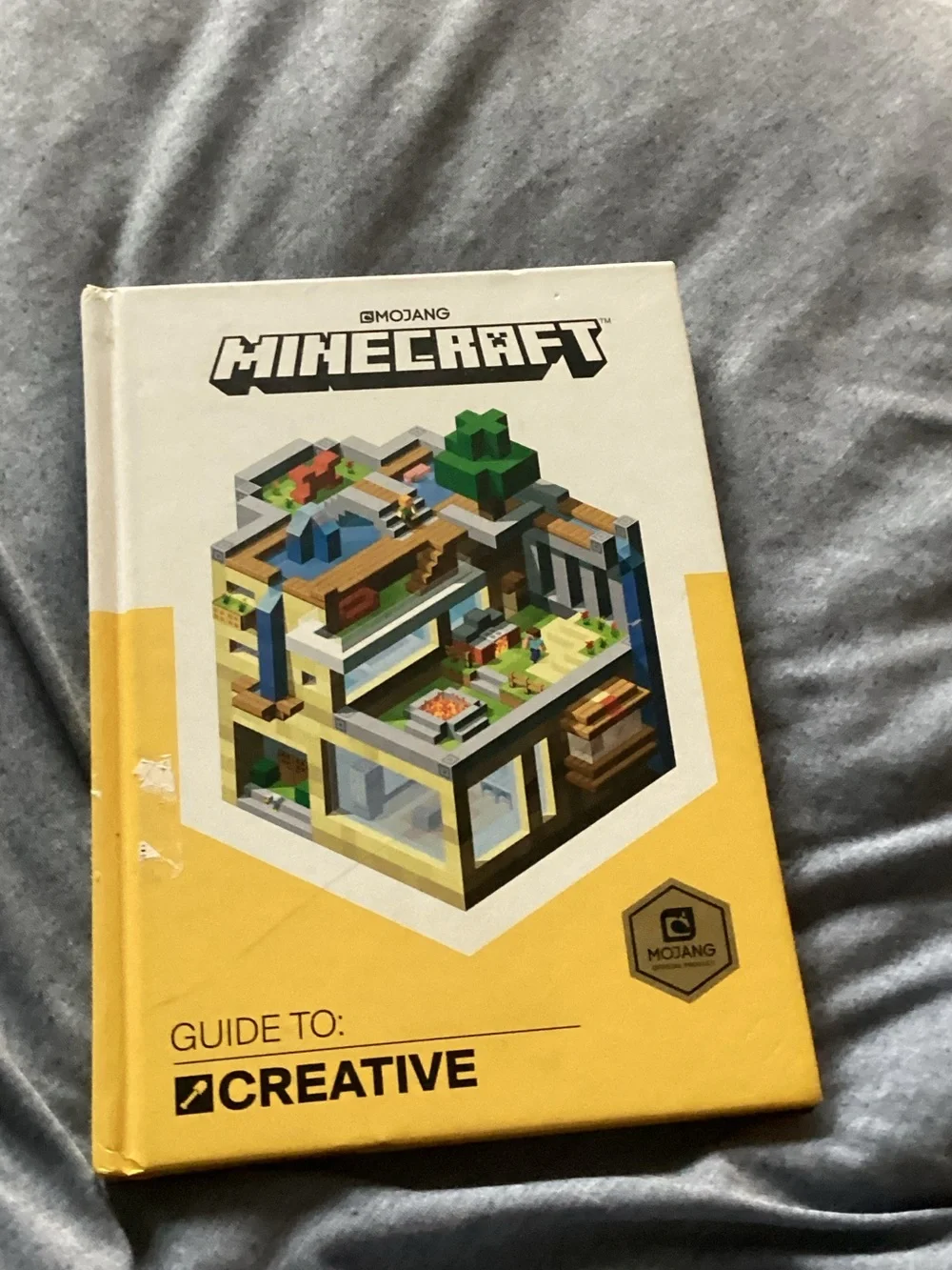 Minecraft Guide to Creative Hardcover Book - Mojang - Yellow